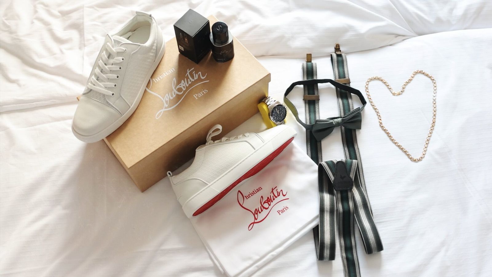 Flat-lay product photography of sneakers, watch, and accessories